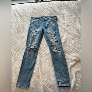 American Eagle Light blue skinny jeans with rips